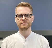 dr Adrian Szewczyk